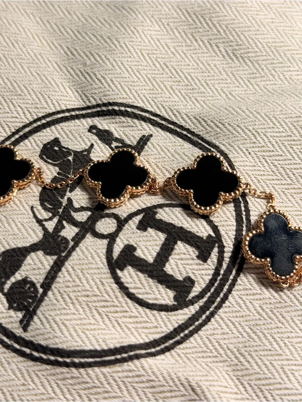 Van Cleef & Arpels Gold Bracelet with Black Alhambra Motifs